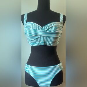Fun and functional, light blue and white striped bikini. Worn once.